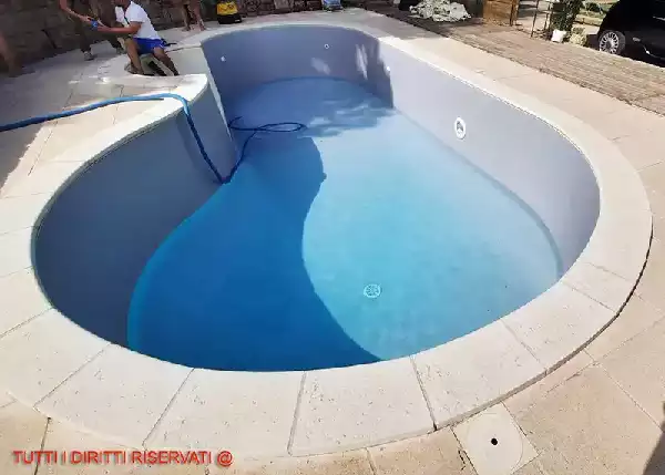 Sostituzione membrana PVC su piscina a fagiolo in lamierino foto 7